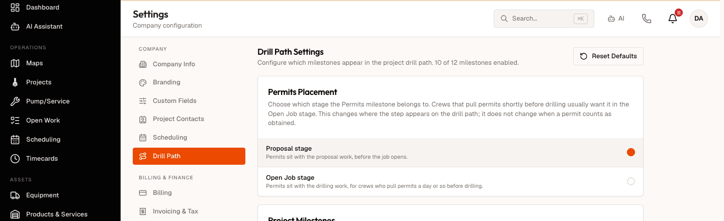 The Permits Placement card on the Drill Path Settings page. Its description reads that you choose which stage the Permits milestone belongs to, that crews who pull permits shortly before drilling usually want it in the Open Job stage, and that this changes where the step appears on the drill path but not when a permit counts as obtained. Two rows follow: Proposal stage, described as permits sitting with the proposal work before the job opens, with its radio selected; and Open Job stage, described as permits sitting with the drilling work for crews who pull permits a day or so before drilling.