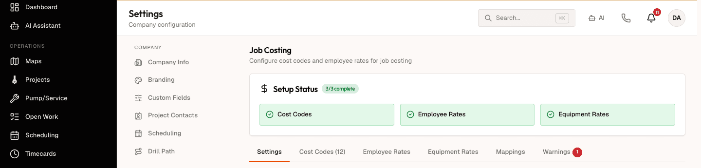 The Settings > Job Costing page in the DrillerDB console. Job Costing is highlighted in the settings list under Billing & Finance. A Setup Status card carries a green 3/3 complete badge above three green pills, each with a check icon, reading Cost Codes, Employee Rates, and Equipment Rates. Below the card runs the tab row Settings, Cost Codes (12), Employee Rates, Equipment Rates, Mappings, and Warnings with a red 1 badge.
