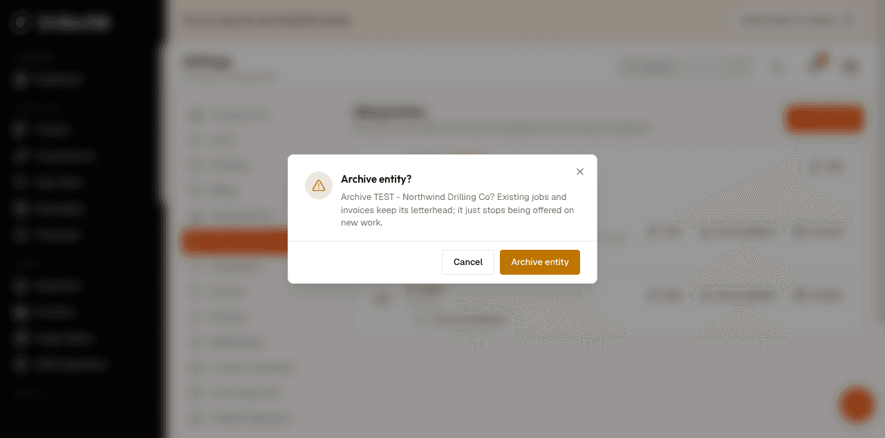 Archive entity confirmation dialog reading 'Archive [entity]? Existing jobs and invoices keep its letterhead; it just stops being offered on new work.' with Cancel and Archive entity buttons.