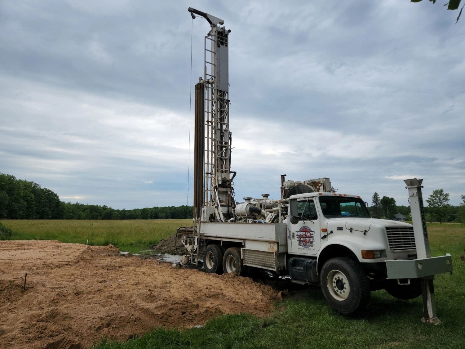 Drews and Koeppel Well Drilling logo